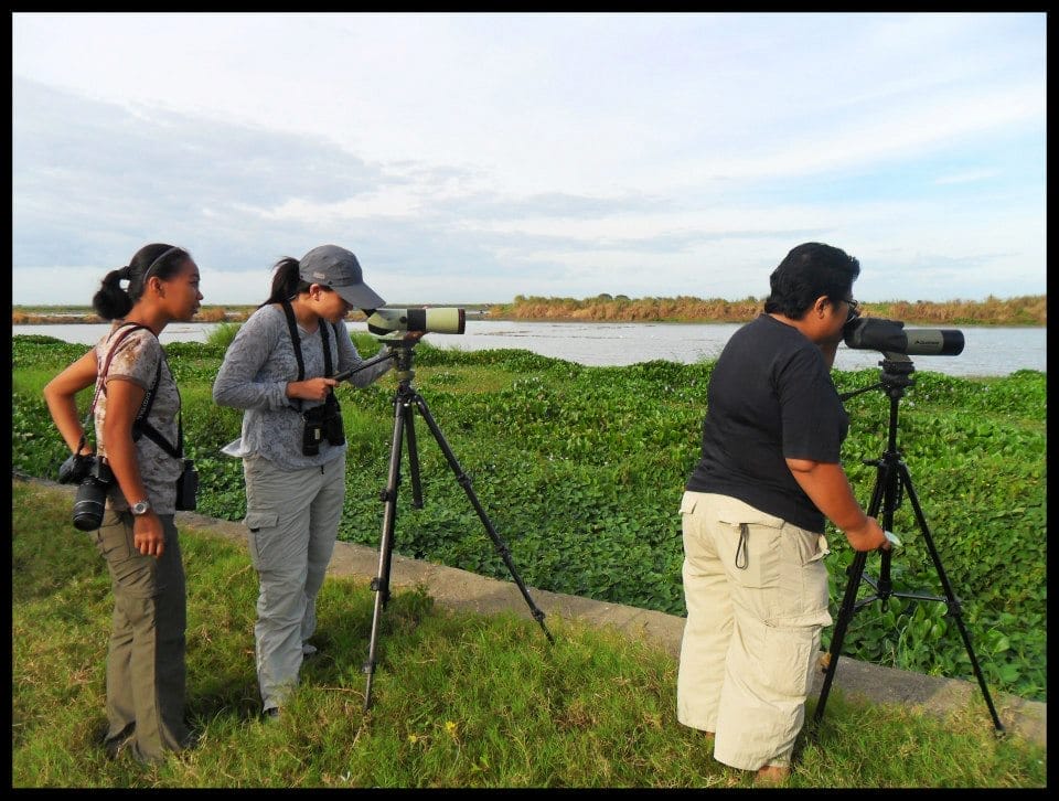 Joni, Maia, and Tinggay spotting birds in the ponds. Photo by Marites Falcon.