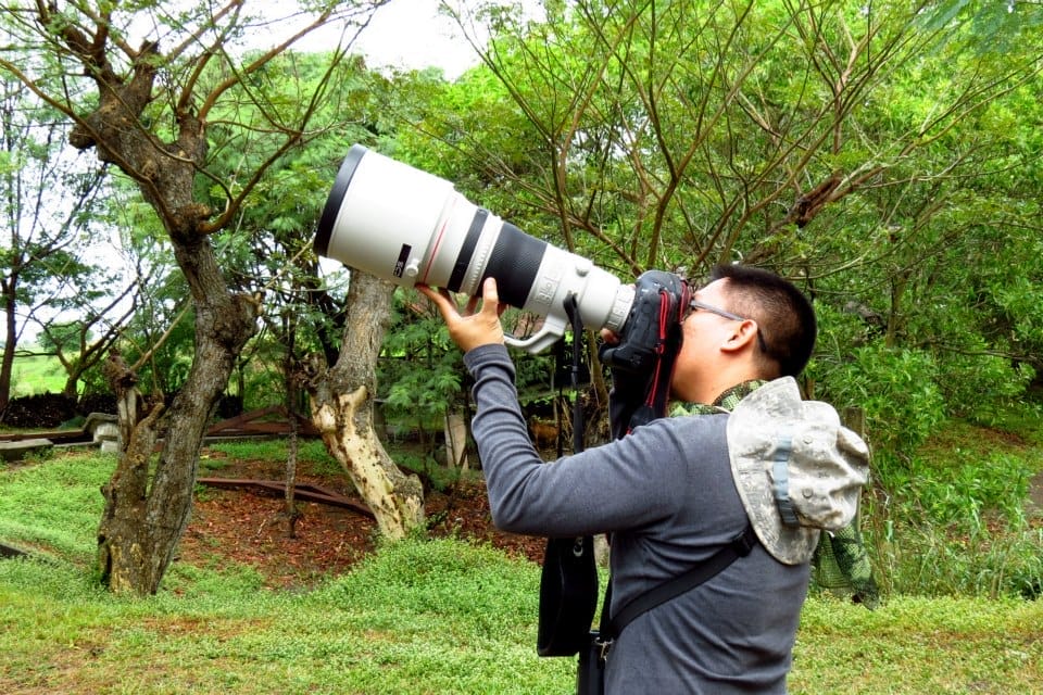 Jun Osano with the gear from Canon. Photo by Maia Tañedo.