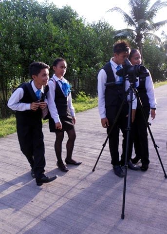 ZSCMST students birdwatching at fishponds on campus.