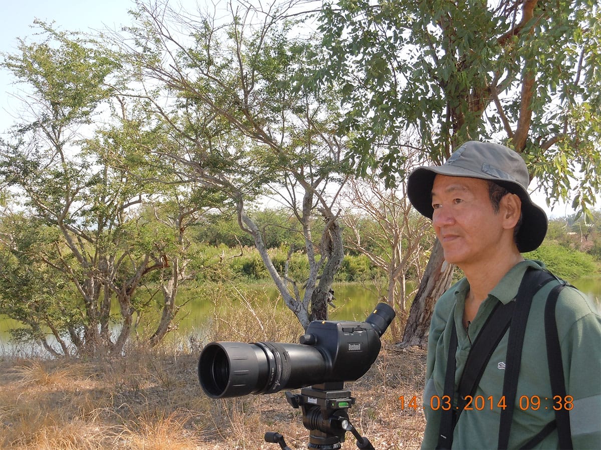 Richard Ruiz with his trusty scope in his favorite patch -- a private fishpond in Barangay Gabu.  